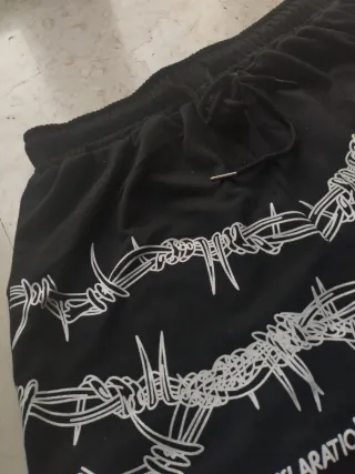 Pantalones cortos chándal negros con diseño