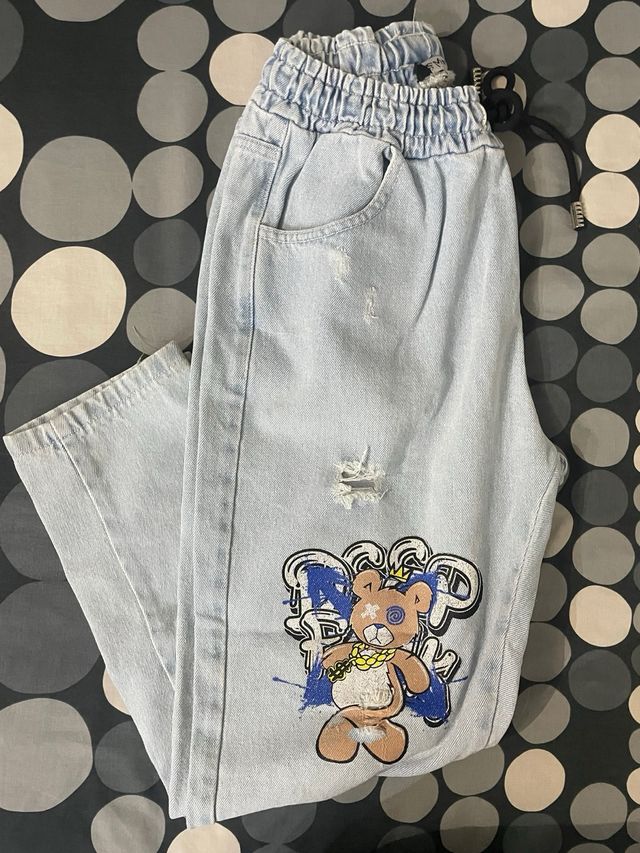 Jeans con stampa orso