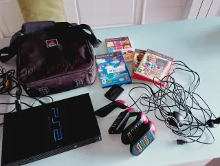 Consola PlayStation 2 con funda y juegos