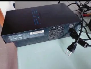 Consola PlayStation 2 con funda y juegos