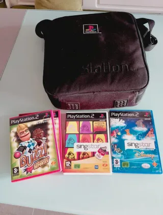 Consola PlayStation 2 con funda y juegos