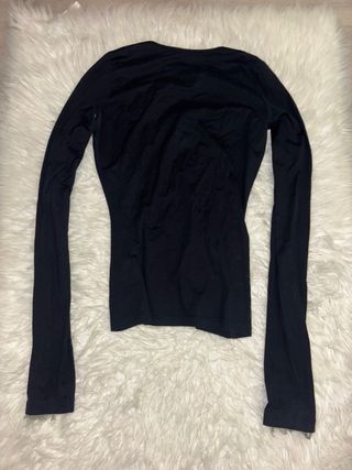 Blusa manga larga escote redondo