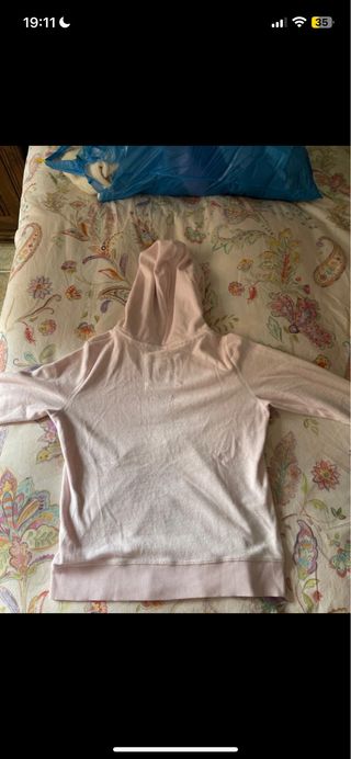 Sudadera rosa con capucha y cremallera