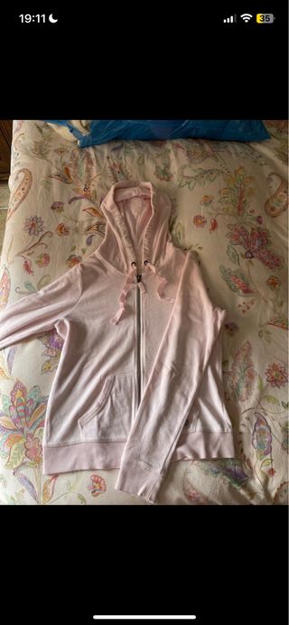 Sudadera rosa con capucha y cremallera