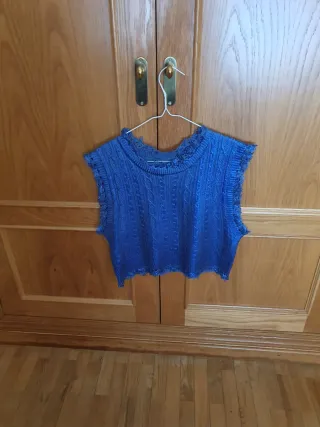 Chaleco azul metalizado con trenzas