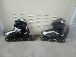 Patines en línea negros y blancos,talla 42,5


