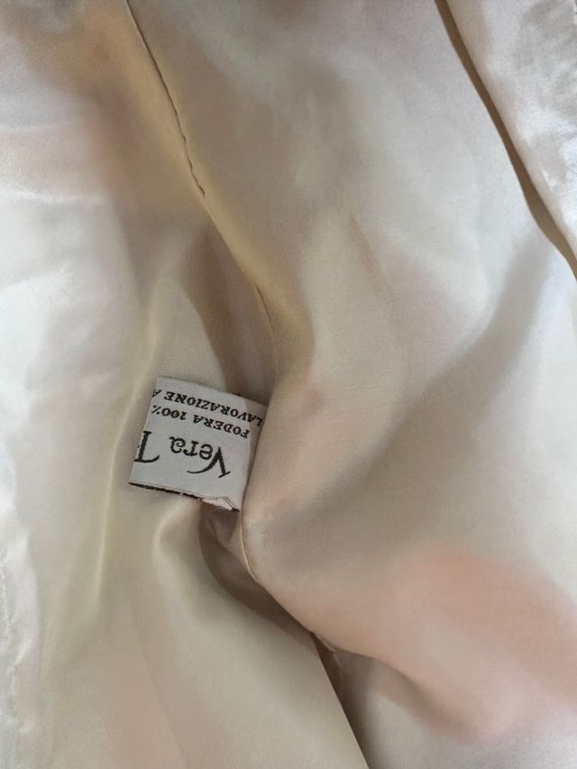 Giacca in pelle color panna con fodera