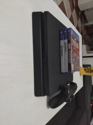 Consola PS4 + Mando + Juegos