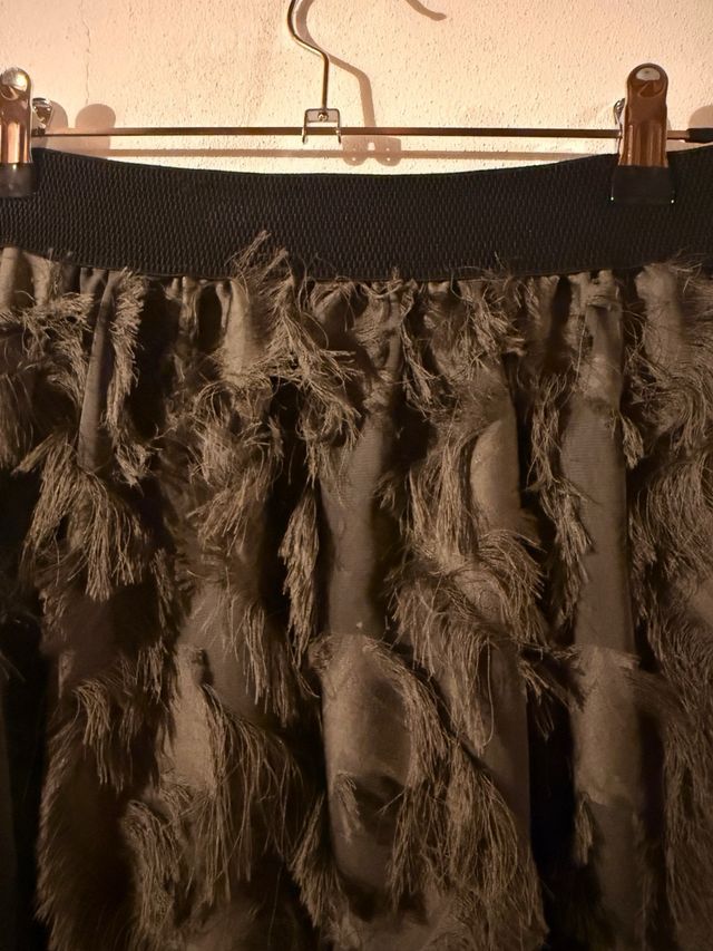 Gonna verde con frange