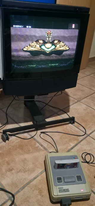Super Nintendo con cables y mando