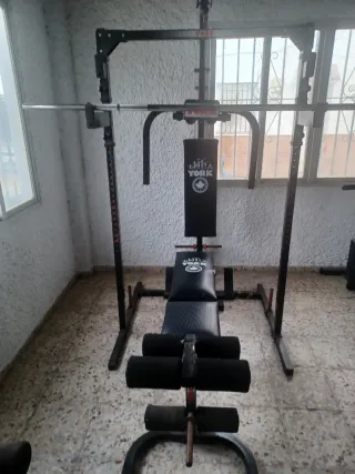 Banco de pesas York con barra