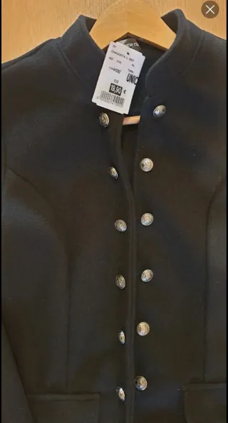 Americana negra de punto. Talla S. Nueva