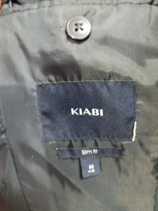 Traje de chaqueta azul marino.