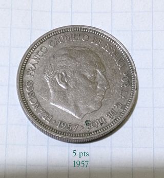 moneda de 5 pts año 1957 con la estrella borrada
