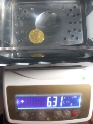 Moneda de Oro