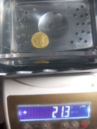 Moneda de Oro