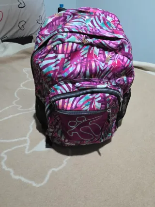 Mochila escolar multicolor como nueva