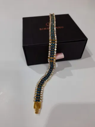 Pulsera Singaru Azul y Dorada a Estrenar