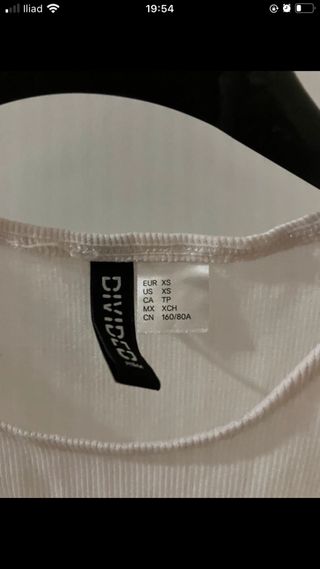 Vestito Divided bianco con lacci taglia XS