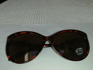 Gafas de sol montura felina