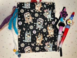 Libreta Bluey y 2 bolígrafos