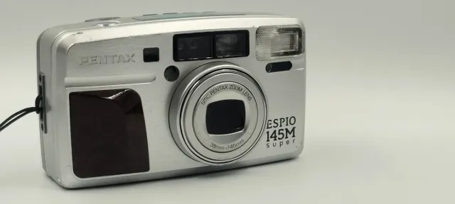 CAMARA SHOOT AND POID PENTAX 145 M super 35mm