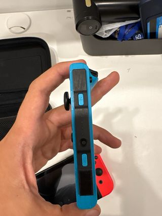 Nintendo Switch Console Blu/Rossa + Porta Giochi