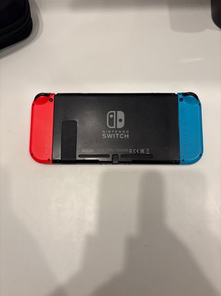 Nintendo Switch Console Blu/Rossa + Porta Giochi