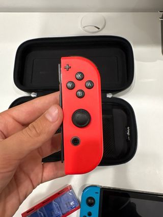Nintendo Switch Console Blu/Rossa + Porta Giochi
