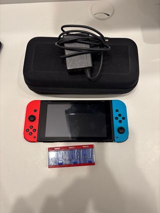 Nintendo Switch Console Blu/Rossa + Porta Giochi