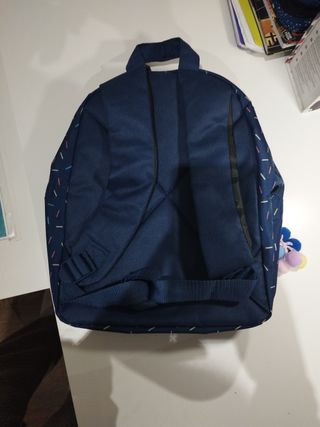 Mochila pequeña azul con estampado de confeti