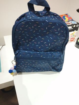 Mochila pequeña azul con estampado de confeti