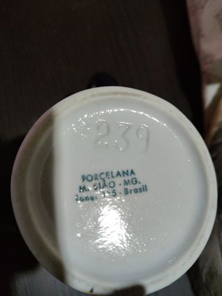 Brocca in ceramica decorata blu