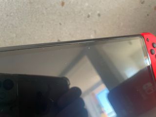 Nintendo Switch OLED blu/rosso