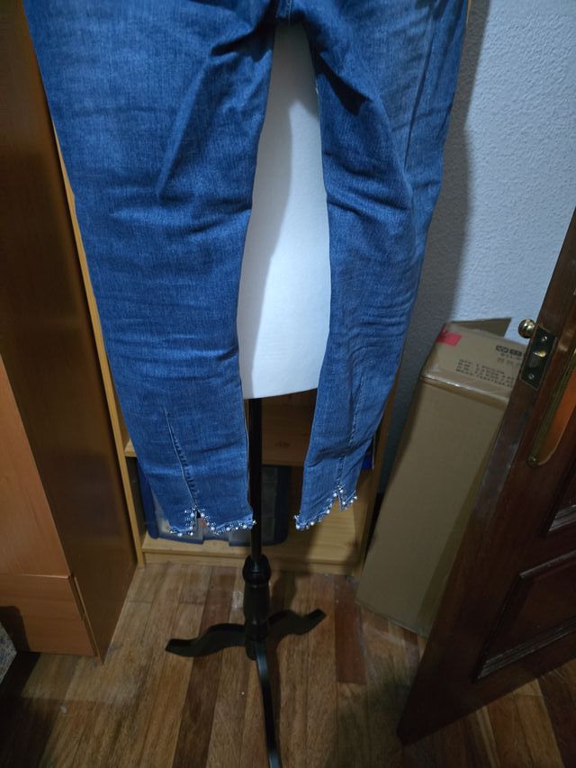 Jeans blu con perle