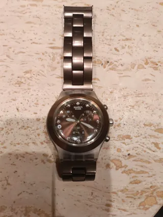 Reloj Swatch Cobrizo-Plateado Original