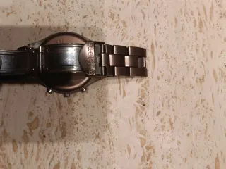 Reloj Swatch Cobrizo-Plateado Original