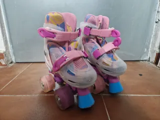 Patines rosas y morados para niña con luces