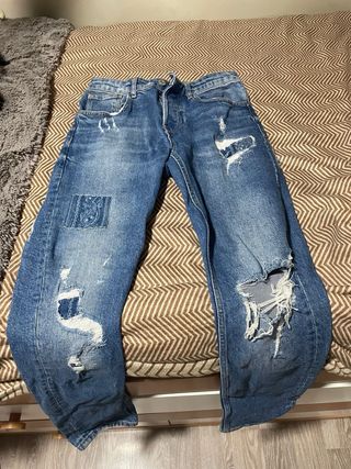 Pantalones vaqueros desgastados azules