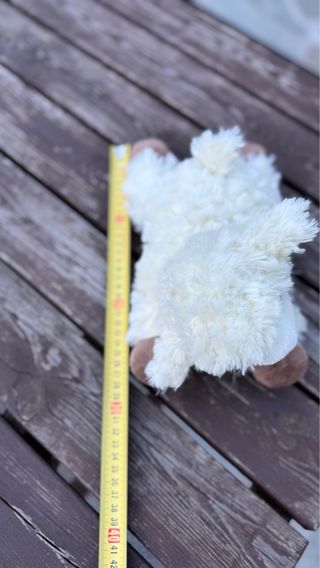 Pecora peluche decorativa