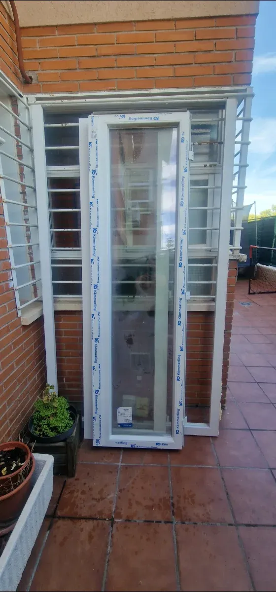 Puerta doble hoja PVC exterior