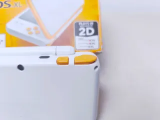 New Nintendo 2DS XL Naranja y Blanco En Caja