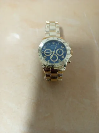 Orologio di lusso in oro e blu