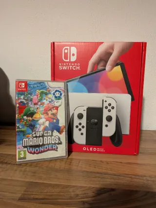 Nintendo Switch Oled Edición blanca + Mario Wonder