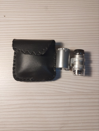 Lupa para monedas con luz UV