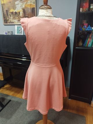 Vestido rosa con colgante