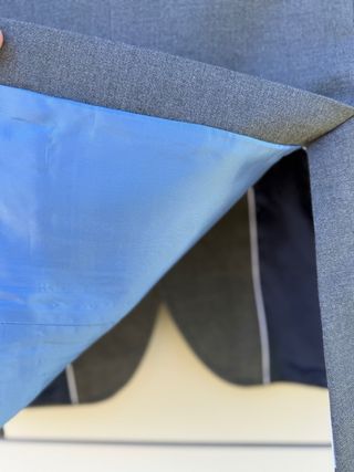 Blazer El Ganso gris coderas celestes 
