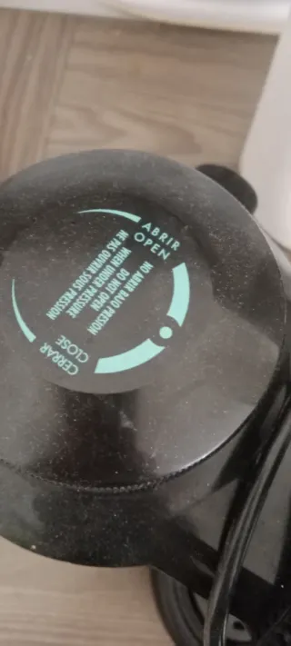 Cafetera con advertencia de presión