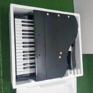 Piano de cola infantil negro