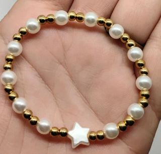 Pulsera perlas y estrella dorada